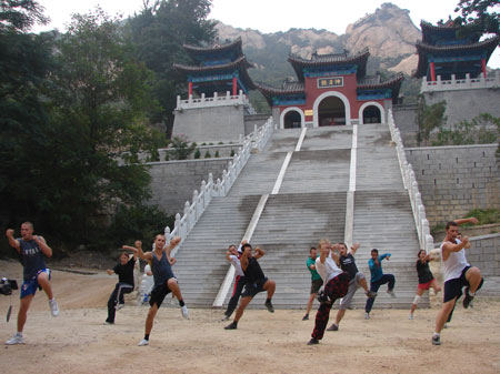 The students practising shaolin kung fu in the Daoism Temple near academy.